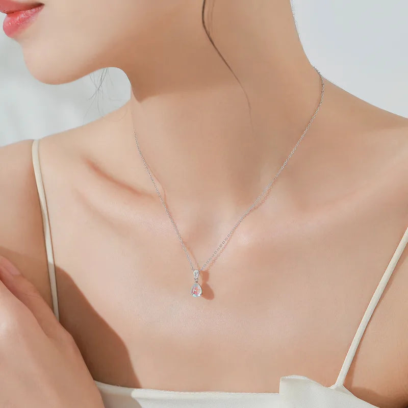 Set de aretes y collar de gota con piedra lunar