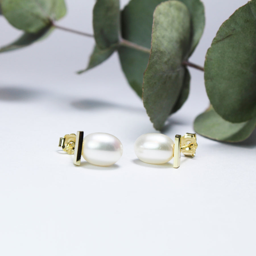 Aretes elegantes de perla natural